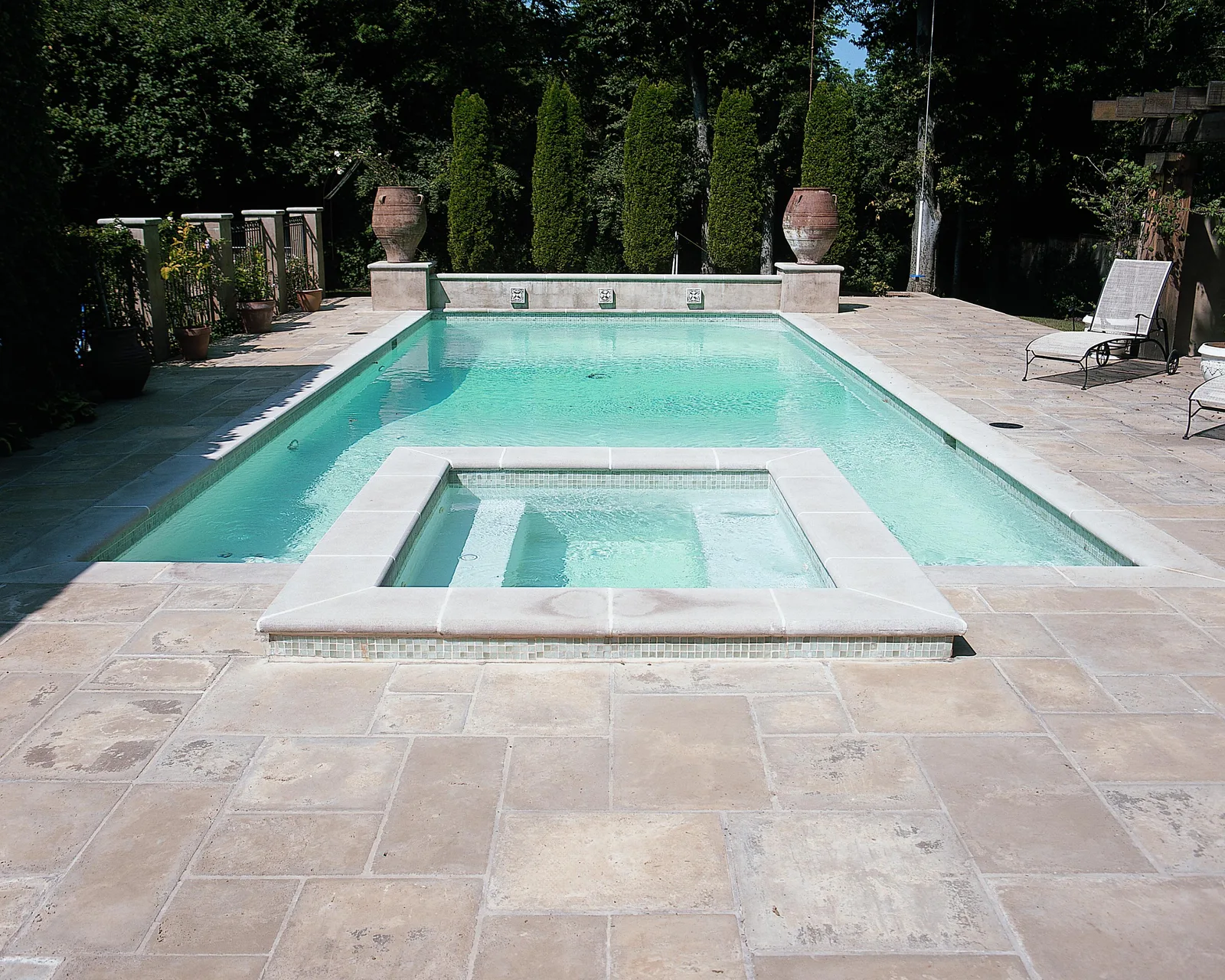 Before and after pool renovation showing a transformed Nashville backyard pool